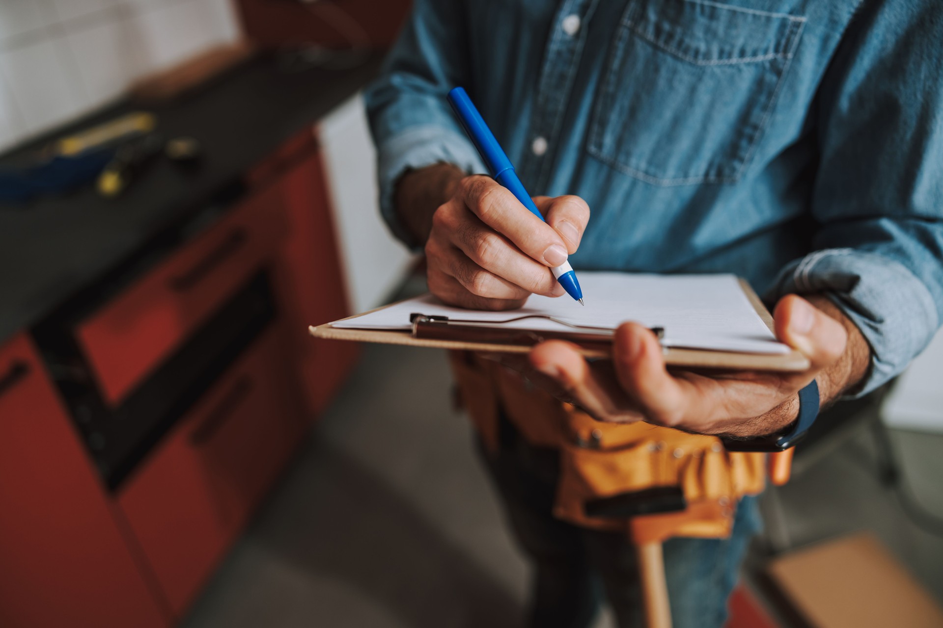Making notes at repair work stock photo